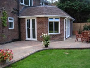 Finished single storey rear extension with hipped tiled roof, Camberley