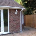Extension with brickwork and outdoor patio for garden enhancement.
