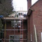 Construction of new extension on residential house in progress.