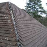 Roof renovation with new tiles at ConstrucTek, UK.