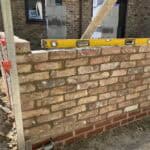 Extension brickwork construction in progress at Wrecclesham.