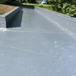 Flat roof waterproofing with durable membrane in Wrecclesham.