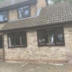 Rear extension with brickwork and large windows in Wrecclesham.