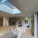 Spacious interior of a single story rear extension in Wrecclesham, showcasing contemporary design an.