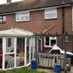 Rear extension with conservatory and outdoor patio in Tongham.