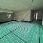 Underfloor heating installation in a new residential property under construction.