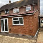 Modern single storey rear extension in Tongham enhancing outdoor living space and property value.