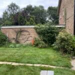 Garden landscaping and renovation by ConstrucTek in a residential area.