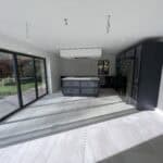 Contemporary kitchen extension in Normandy with spacious open-plan design and natural light.