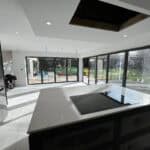 Contemporary extension and refurbishment project in Normandy showcasing sleek design and open-plan l.