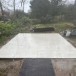 Porcelain patio surface with sleek, durable tiles in Wrecclesham. Perfect for outdoor living and gar.