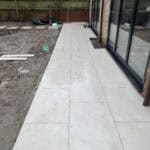 Modern porcelain patio paving outside a house in Wrecclesham, perfect for outdoor living spaces.
