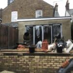 Extension shell up with the new brick retaining wall