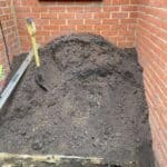 The small alcove at the back of the bungalow before the extension