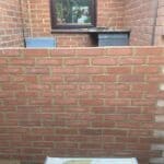 New brick walls matched to the bungalow