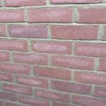 New brickwork with weather-struck pointing to match the existing bungalow