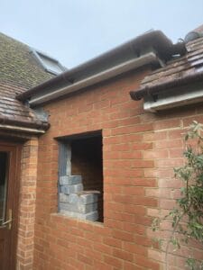 Small rear extension in matched brick, Farnborough