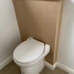 The finished downstairs WC with the pipework boxed in