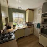 The original separate kitchen before the wall came out