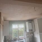 New opening plastered with the steel beam boxed in