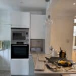 New kitchen tall units with built-in oven and microwave