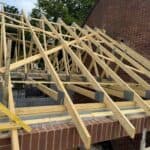 New roof trusses on the rebuilt side extension