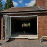 Rebuilt side extension with bifold doors open to the garden