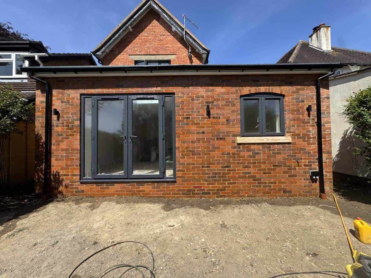 Finished wraparound extension with French doors, Aldershot